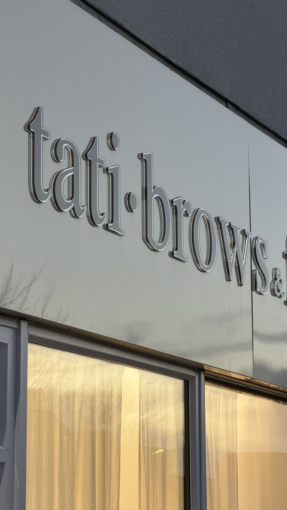 Tati Brows & Facials storefront signage